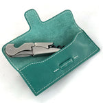 Load image into Gallery viewer, Leather case with stainless steel corkscrew, shown open from front.
