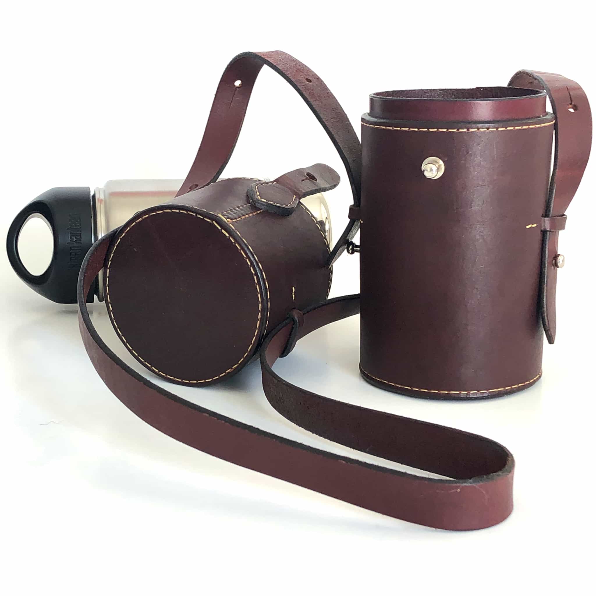 Burgundy latigo leather thermos case with 12 ounce thermos open from the front with thermos behind