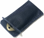 Load image into Gallery viewer, Golf divot tool solid brass with blue aniline leather sleeve, shown inserted.
