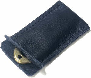 Golf divot tool solid brass with blue aniline leather sleeve, shown inserted.